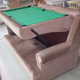 Illustration for article titled This Couch Turns Into a Snooker Table